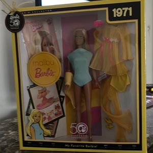 She is an original Barbie doll  she was born in1971 she has never been open come